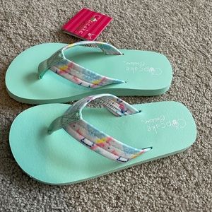 Cupcake Couture New with tags girls flip flops size 4.